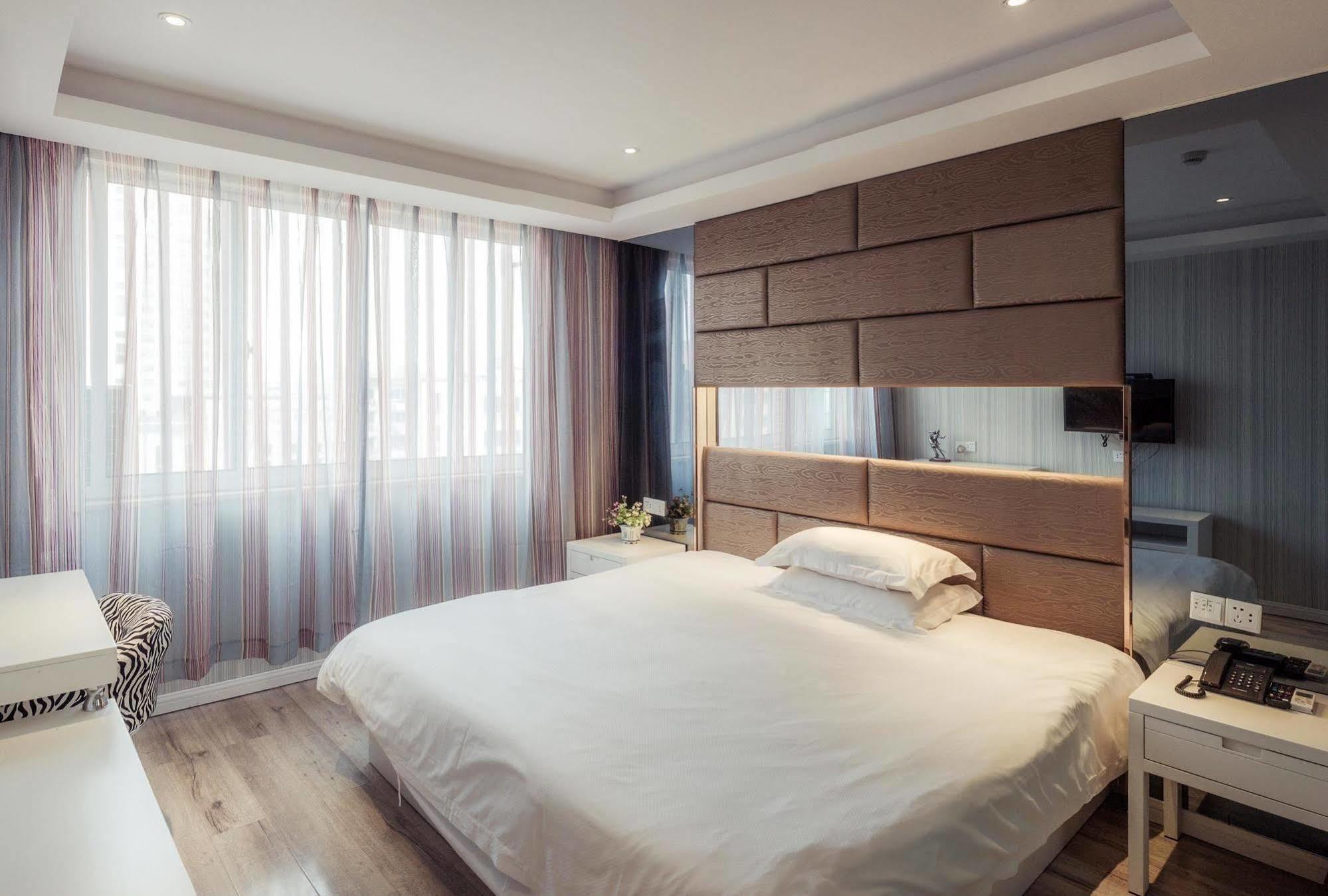 Milan Fashion Hotel Deqing Екстер'єр фото